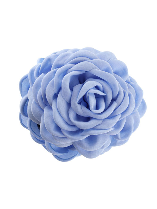 Genom att stara lstor hårklämma tusensköna med blommor