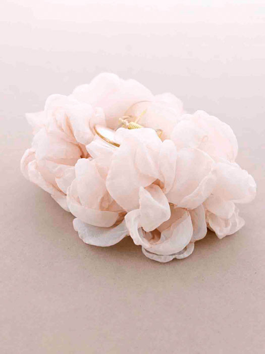 Hårklämma blomma